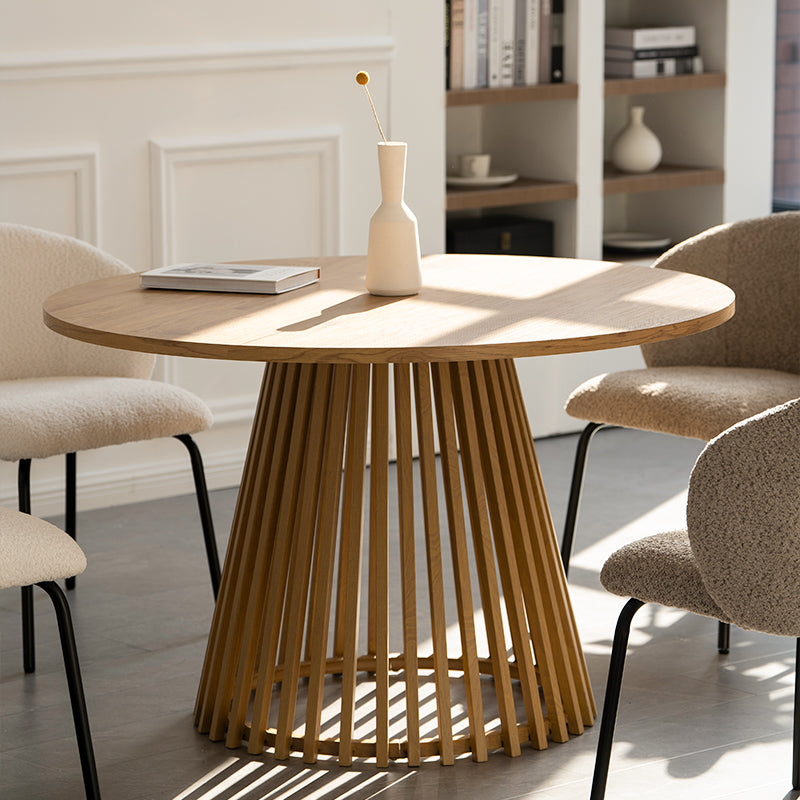 Discover the OFCASA Veronica 120 cm Round Dining Table with oak-effect top and sculptural metal base. Ideal for table and 4 dining chairs in modern UK homes.