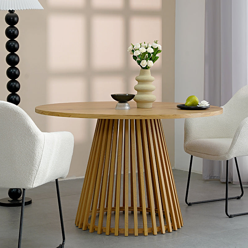 Discover the OFCASA Veronica 120 cm Round Dining Table with oak-effect top and sculptural metal base. Ideal for table and 4 dining chairs in modern UK homes.