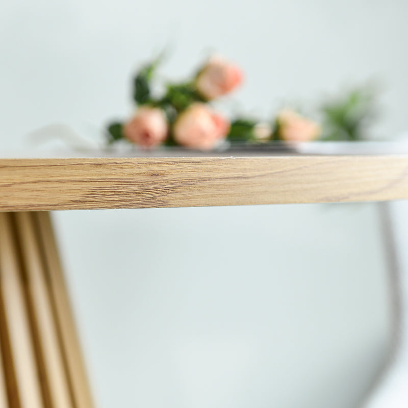 Discover the OFCASA Veronica 120 cm Round Dining Table with oak-effect top and sculptural metal base. Ideal for table and 4 dining chairs in modern UK homes.