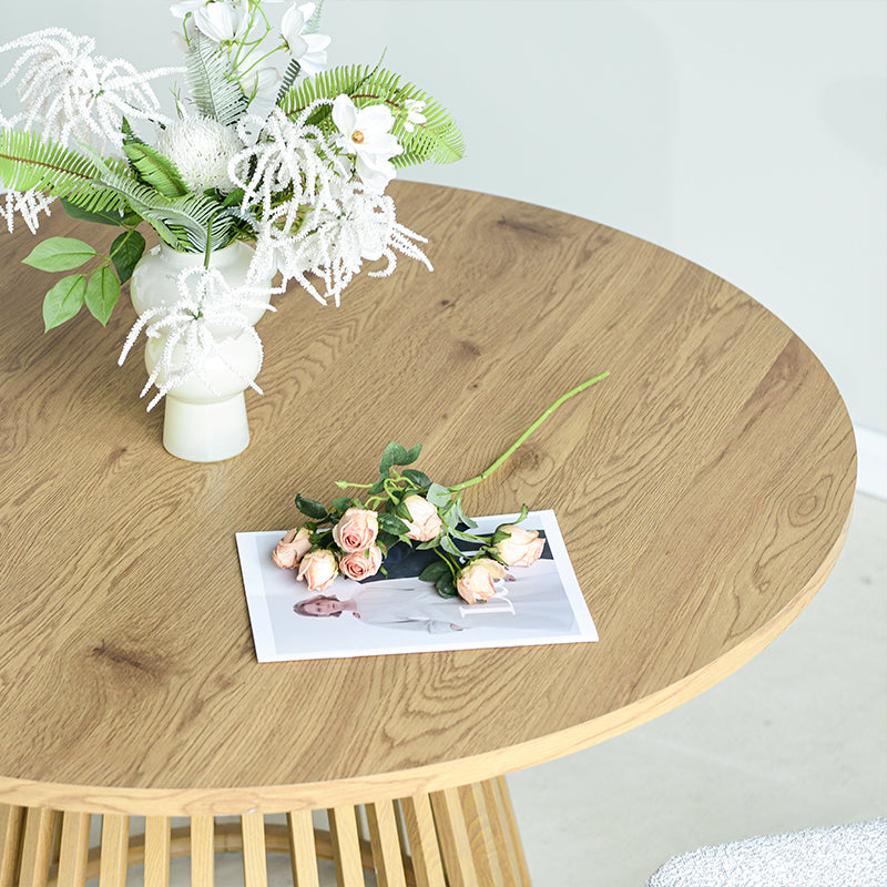 Discover the OFCASA Veronica 120 cm Round Dining Table with oak-effect top and sculptural metal base. Ideal for table and 4 dining chairs in modern UK homes.